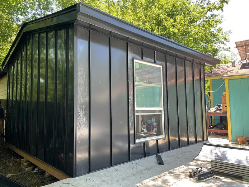 Black standing seam metal wall panels for Metal Roof Installation in Dixon